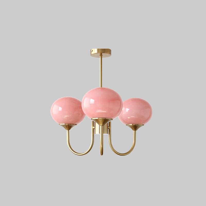 Modern pink and gold chandelier with elegant glass shades, ideal ceiling light fixture for chic home decor and illumination.