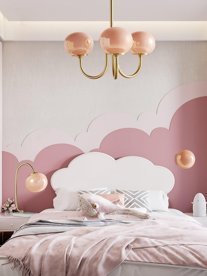 Modern pink and gold chandelier with elegant glass shades, ideal ceiling light fixture for chic home decor and illumination.