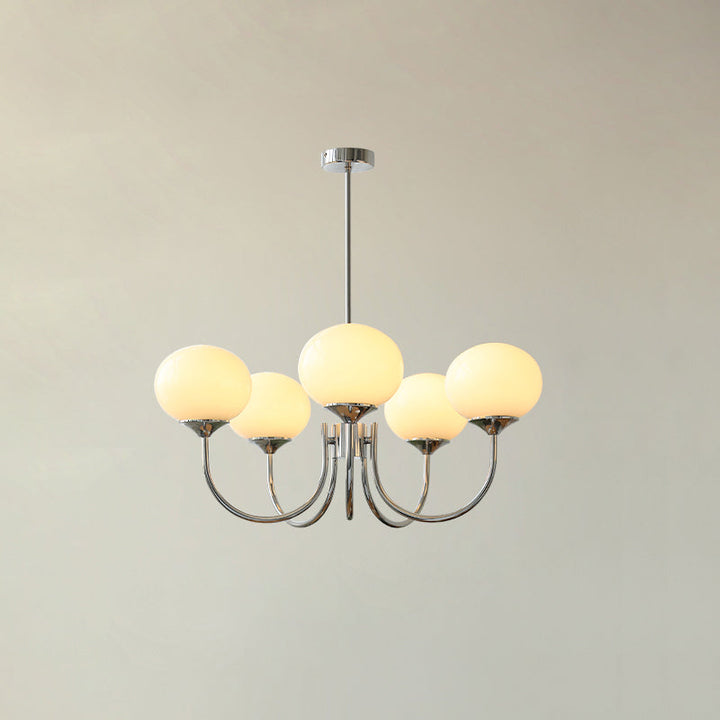 Modern pink and gold chandelier with elegant glass shades, ideal ceiling light fixture for chic home decor and illumination.