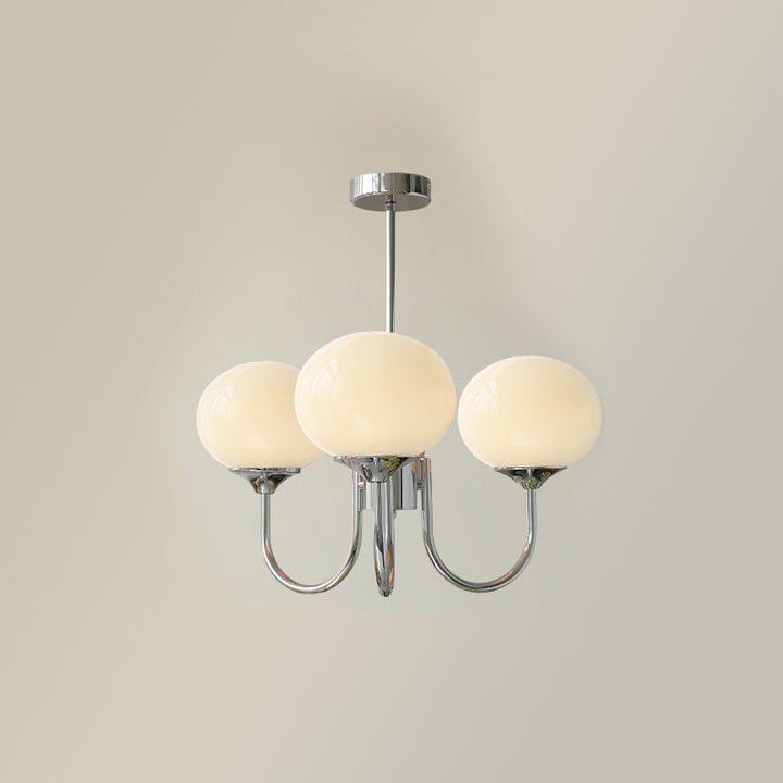 Modern pink and gold chandelier with elegant glass shades, ideal ceiling light fixture for chic home decor and illumination.