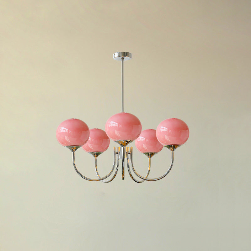 Modern pink and gold chandelier with elegant glass shades, ideal ceiling light fixture for chic home decor and illumination.