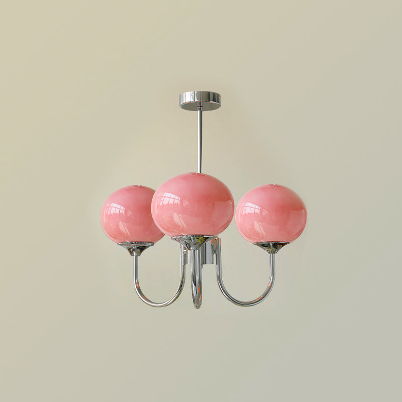 Modern pink and gold chandelier with elegant glass shades, ideal ceiling light fixture for chic home decor and illumination.