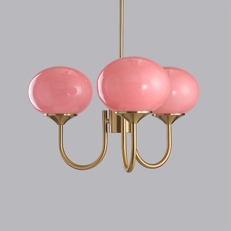 Modern pink and gold chandelier with elegant glass shades, ideal ceiling light fixture for chic home decor and illumination.