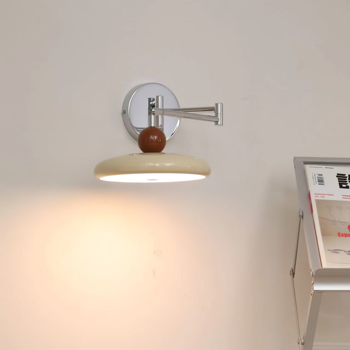 "Modern swing arm wall lamp with adjustable metal arm, acrylic base, integrated LED, beige and green color options."