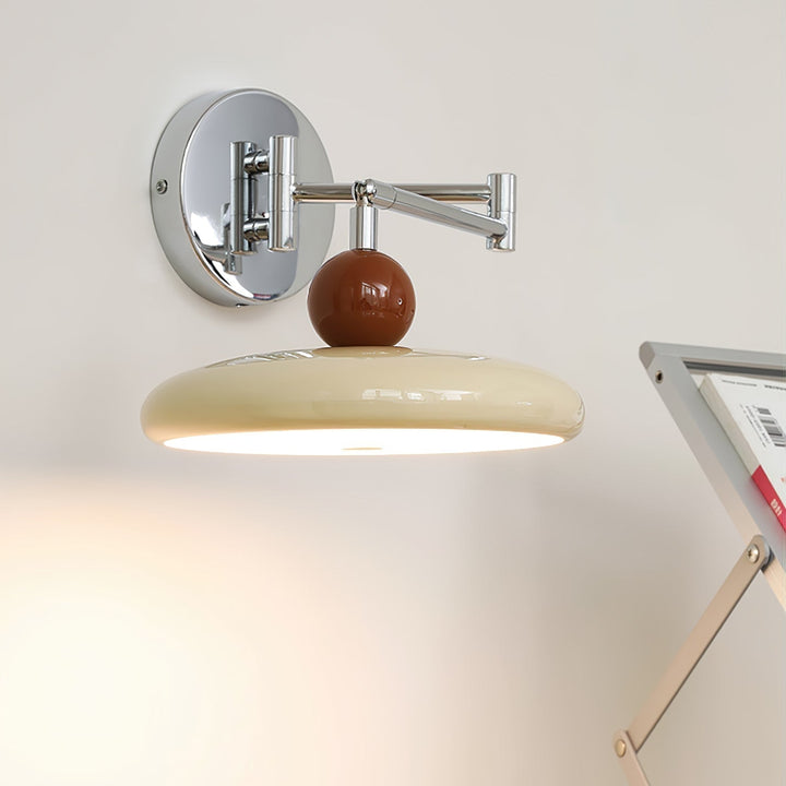 "Modern swing arm wall lamp with adjustable metal arm, acrylic base, integrated LED, beige and green color options."