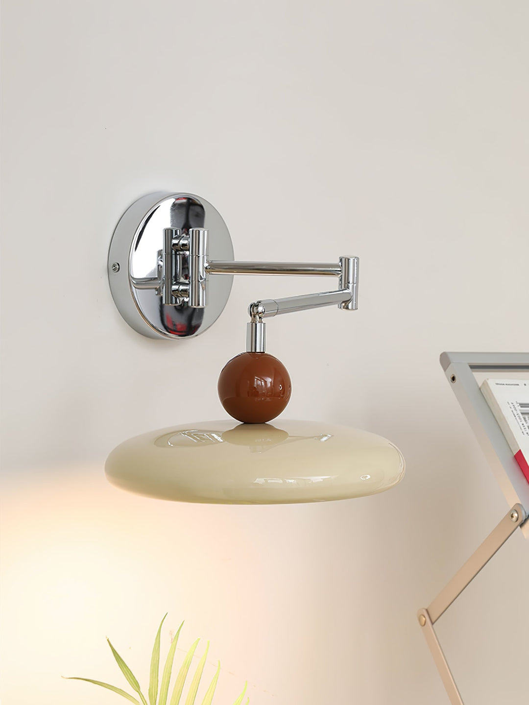 "Modern swing arm wall lamp with adjustable metal arm, acrylic base, integrated LED, beige and green color options."