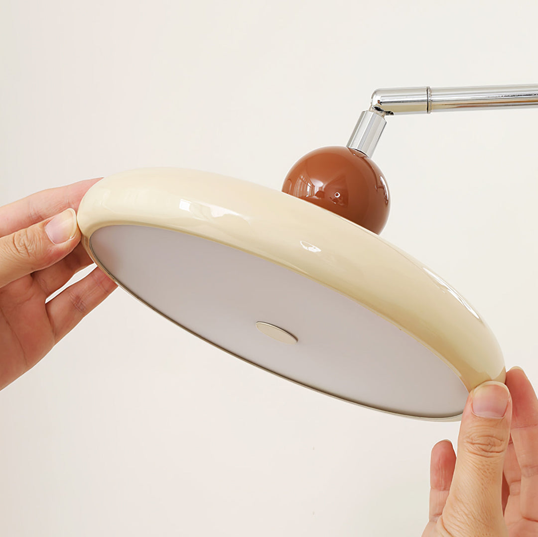 "Modern swing arm wall lamp with adjustable metal arm, acrylic base, integrated LED, beige and green color options."