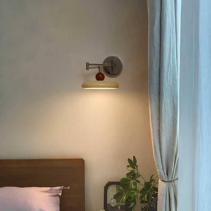 "Modern swing arm wall lamp with adjustable metal arm, acrylic base, integrated LED, beige and green color options."
