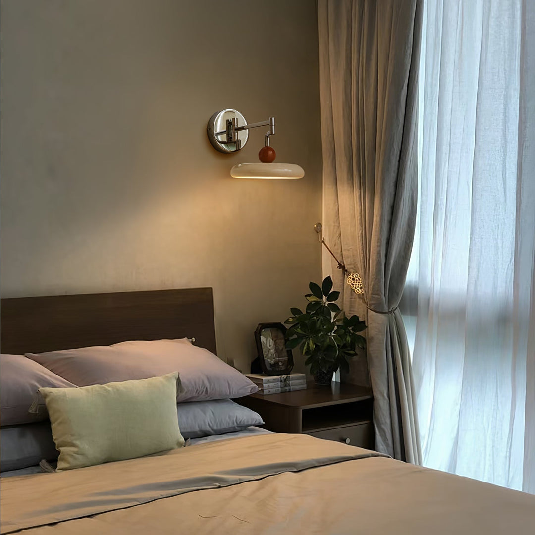 "Modern swing arm wall lamp with adjustable metal arm, acrylic base, integrated LED, beige and green color options."