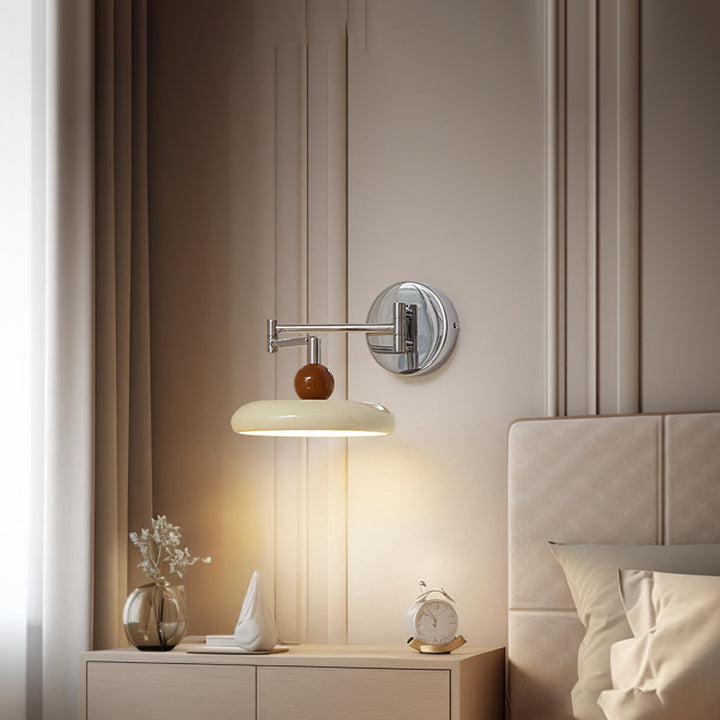 "Modern swing arm wall lamp with adjustable metal arm, acrylic base, integrated LED, beige and green color options."