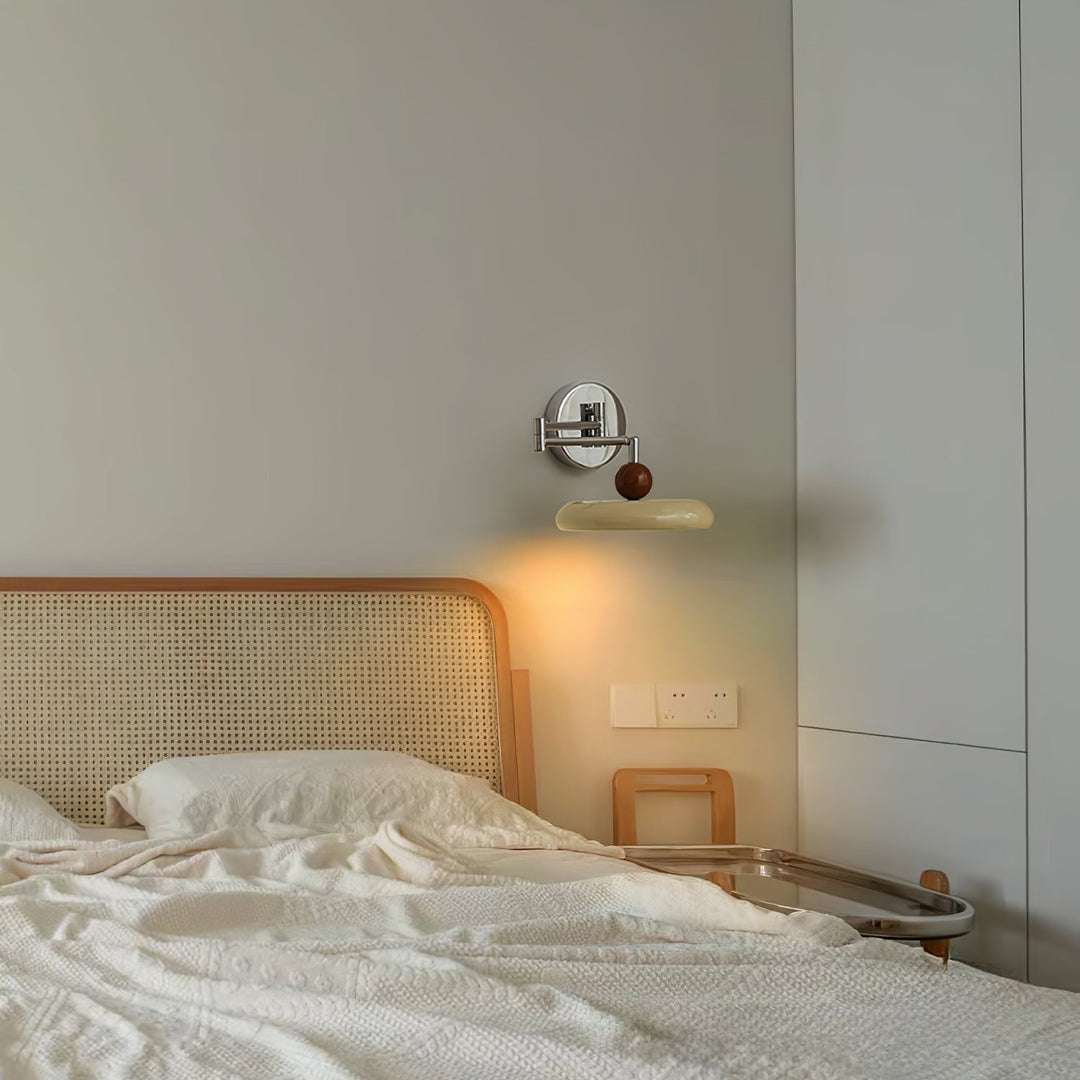 "Modern swing arm wall lamp with adjustable metal arm, acrylic base, integrated LED, beige and green color options."