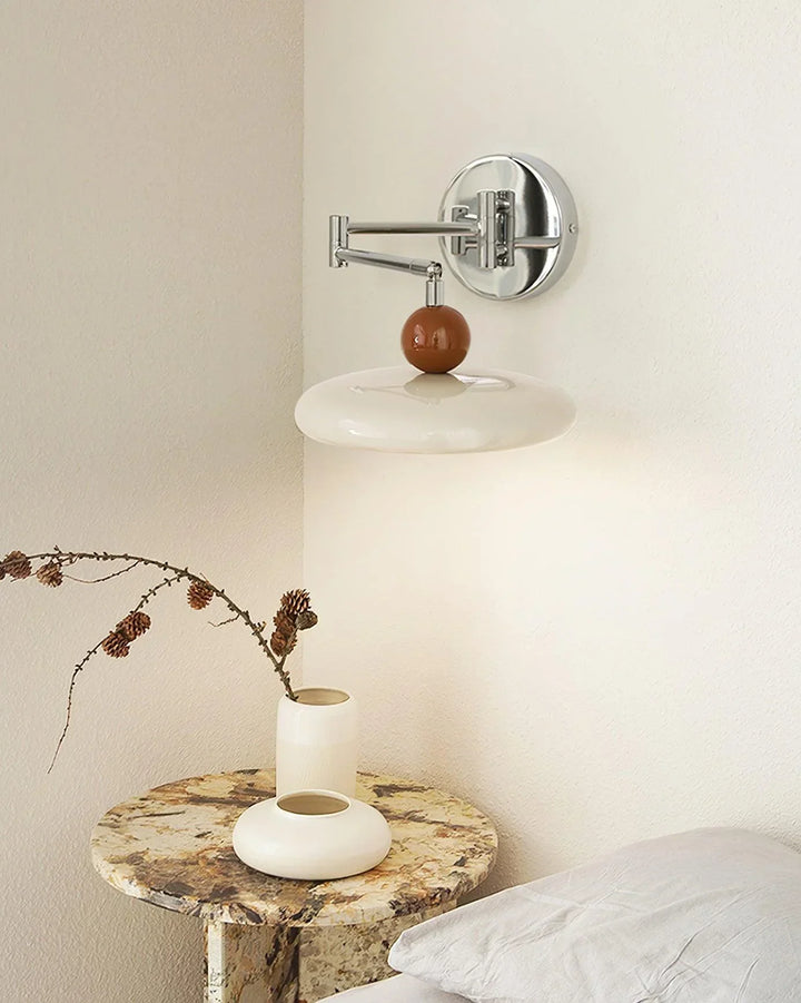 "Modern swing arm wall lamp with adjustable metal arm, acrylic base, integrated LED, beige and green color options."