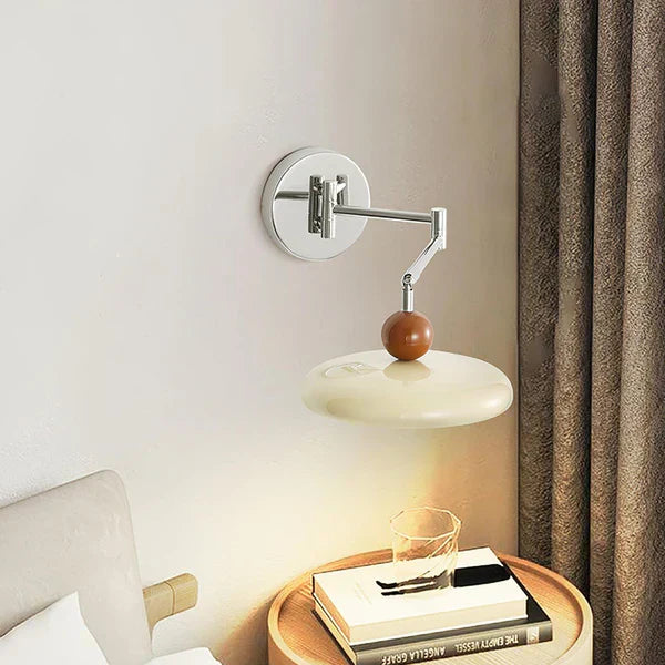 "Modern swing arm wall lamp with adjustable metal arm, acrylic base, integrated LED, beige and green color options."