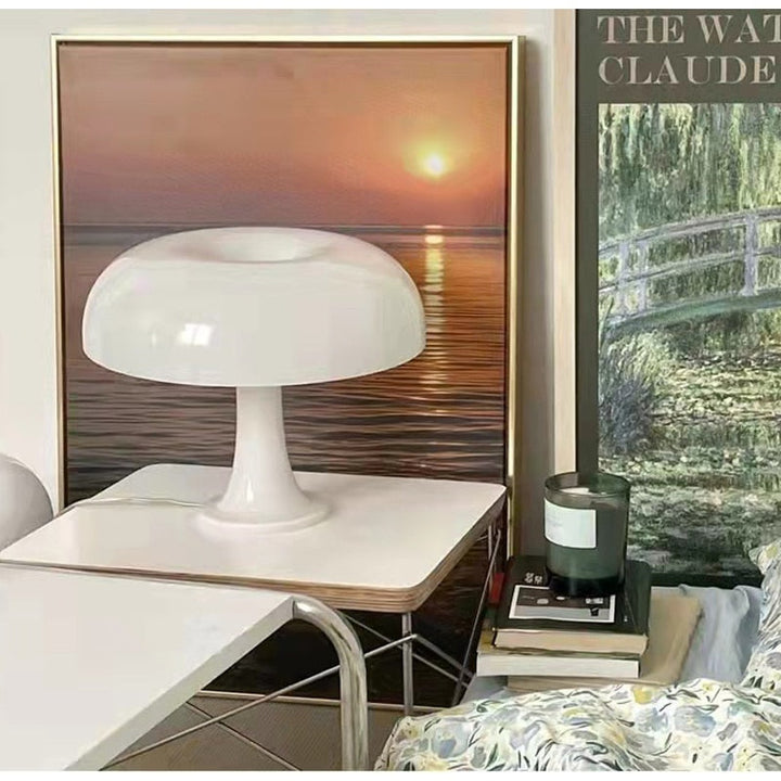 "Mushroom-shaped minimalist table lamp with LED, Nordic design, in white and orange; perfect for modern interiors."