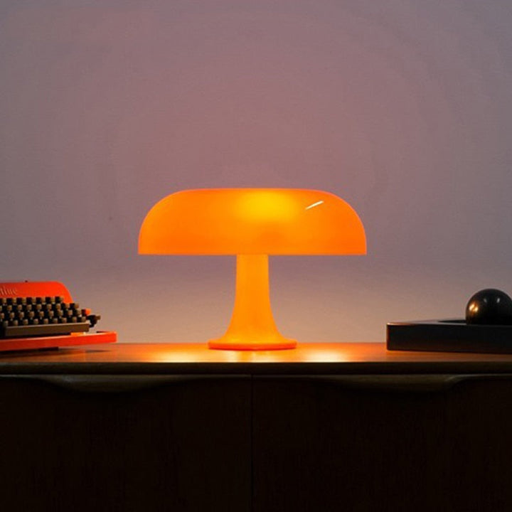 "Mushroom-shaped minimalist table lamp with LED, Nordic design, in white and orange; perfect for modern interiors."