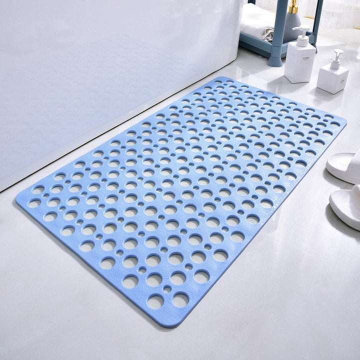 Non-slip shower mat with suction cups, textured for comfort, mold-resistant, in blue, green, grey; enhances bathroom safety.