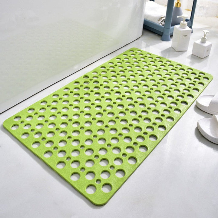 Non-slip shower mat with suction cups, textured for comfort, mold-resistant, in blue, green, grey; enhances bathroom safety.