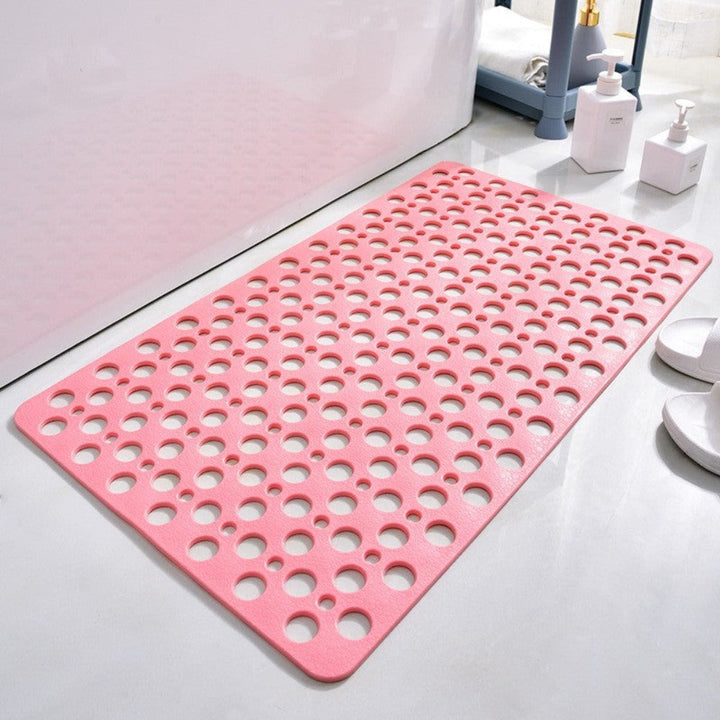 Non-slip shower mat with suction cups, textured for comfort, mold-resistant, in blue, green, grey; enhances bathroom safety.