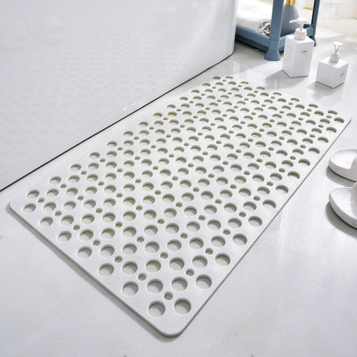 Non-slip shower mat with suction cups, textured for comfort, mold-resistant, in blue, green, grey; enhances bathroom safety.