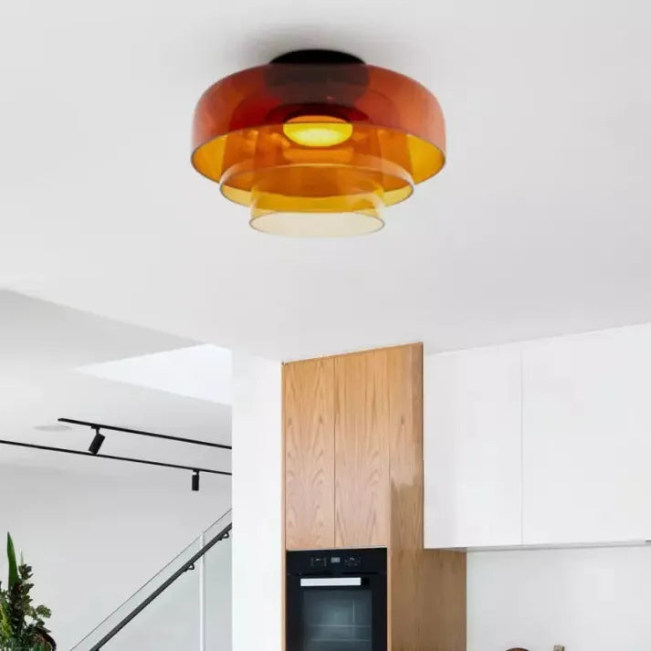 Nordic designer glass ceiling lamp in modern medieval style with elegant glass build, available in gray, green, and orange.