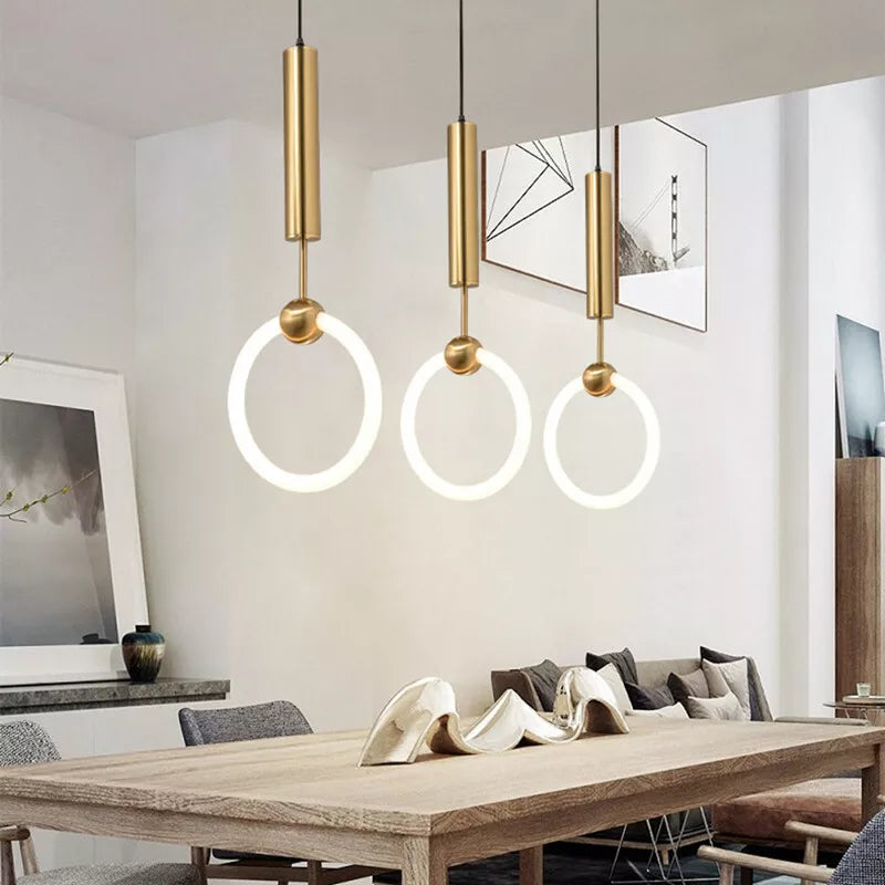 "Nordic LED Pendant Light with sleek metal lines and minimalist design, perfect for modern kitchens and dining areas."
