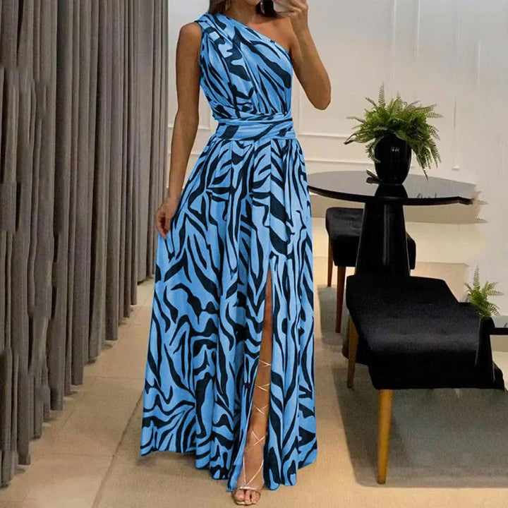 One-shoulder zebra print chiffon maxi dress with high slit, elegant and airy, perfect for summer events.