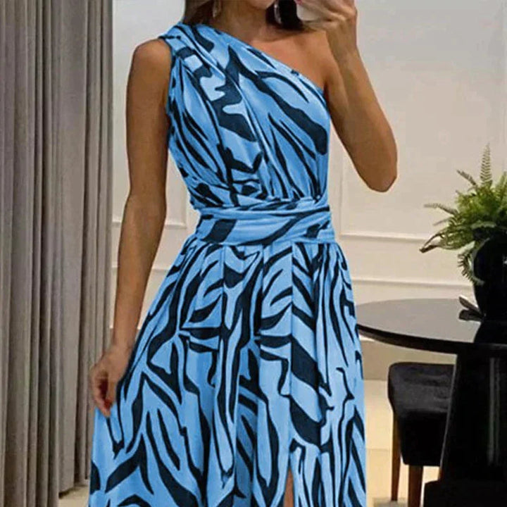 One-shoulder zebra print chiffon maxi dress with high slit, elegant and airy, perfect for summer events.