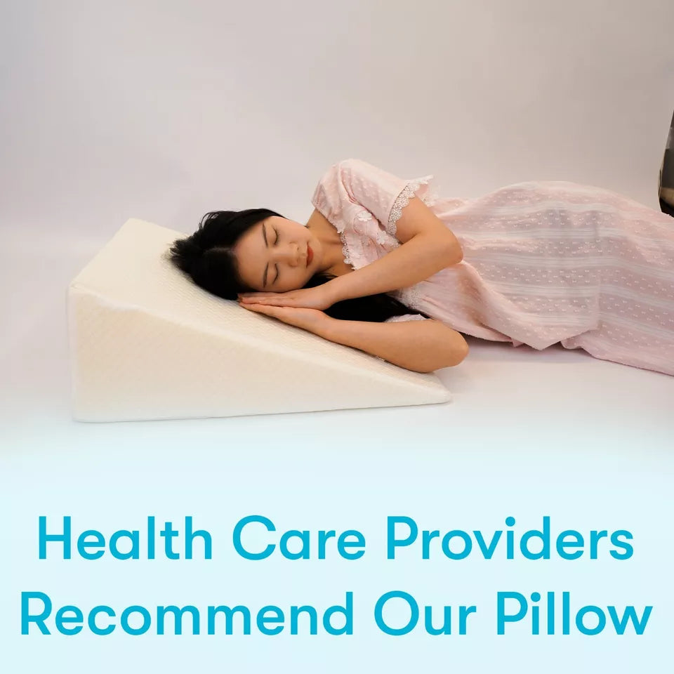 Orthopaedic triangle wedge pillow in white, offering reflux relief, post-surgery support, improves posture and circulation.