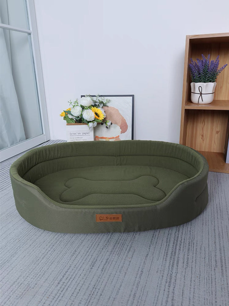 Orthopedic dog bed with memory foam for joint support, featuring a washable cover and non-slip base for optimal pet comfort.