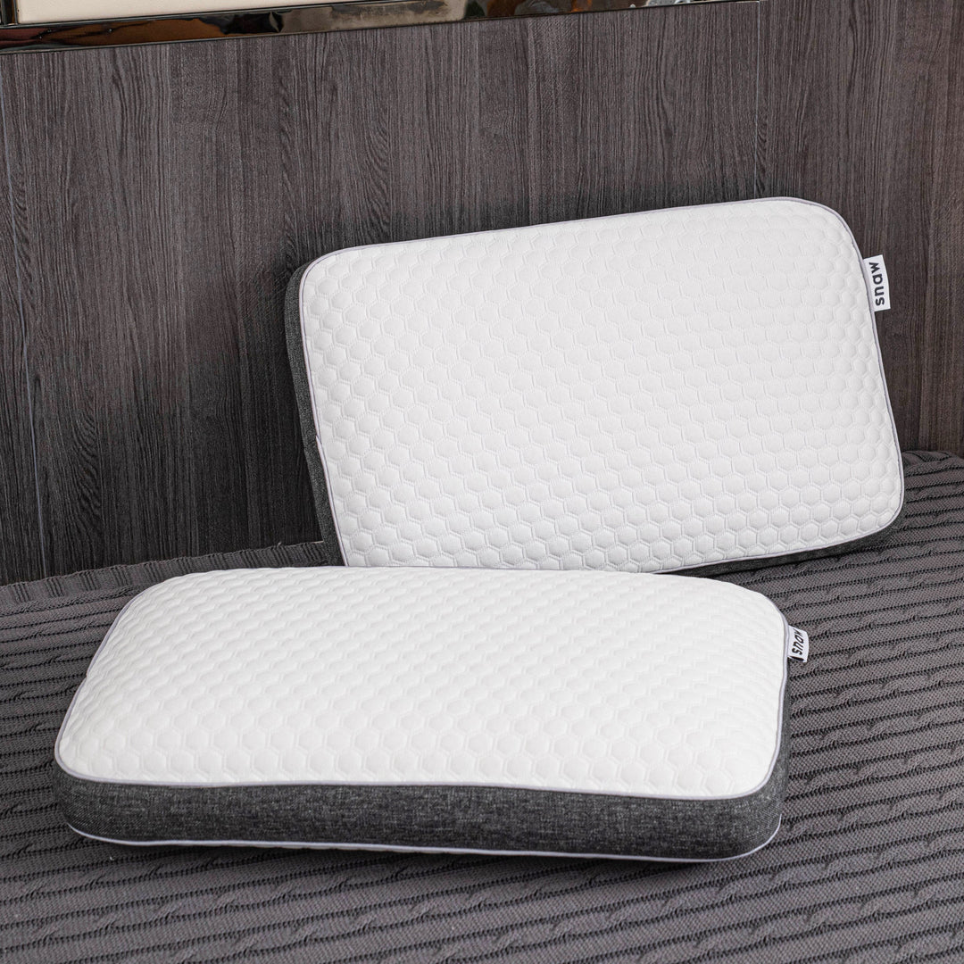 Orthopedic memory foam pillow offering pain-free sleep with ergonomic design and breathable cover for all sleep positions.