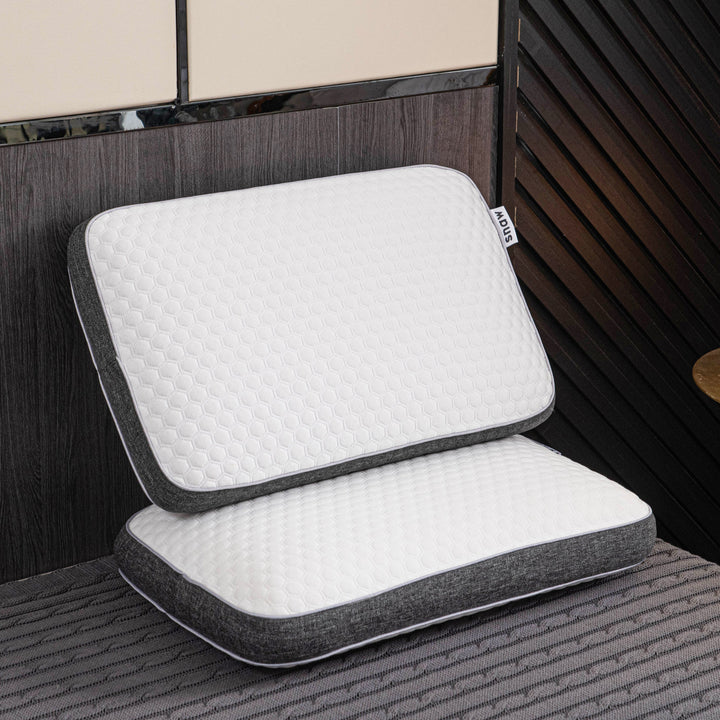 Orthopedic memory foam pillow offering pain-free sleep with ergonomic design and breathable cover for all sleep positions.