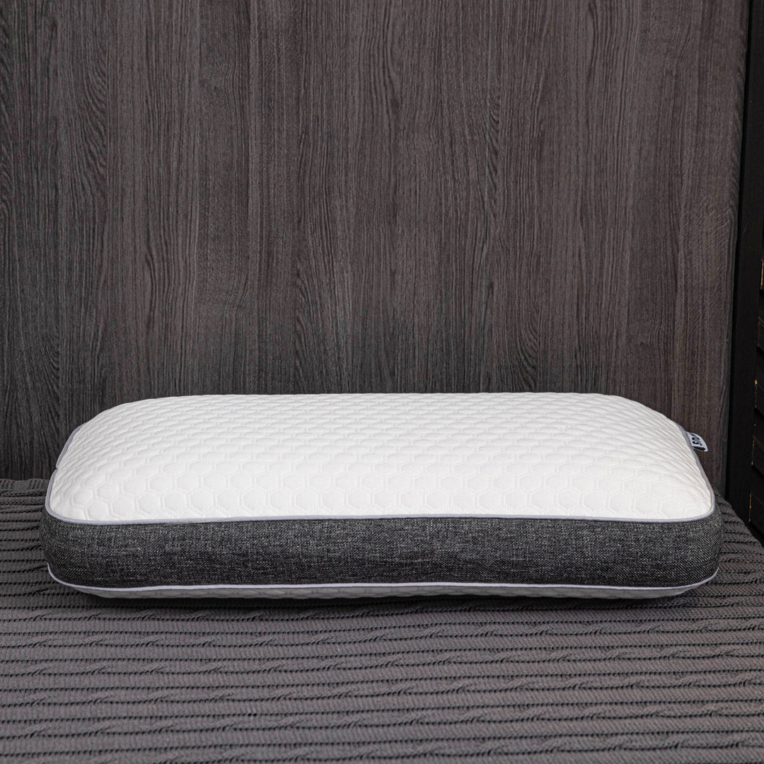 Orthopedic memory foam pillow offering pain-free sleep with ergonomic design and breathable cover for all sleep positions.