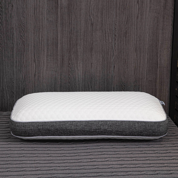 Orthopedic memory foam pillow offering pain-free sleep with ergonomic design and breathable cover for all sleep positions.