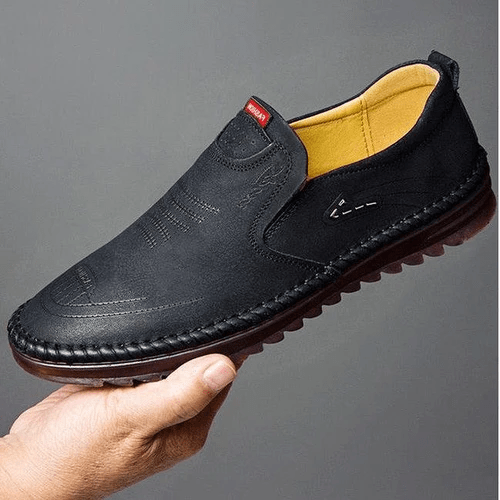 "Orthopedic men's shoes with breathable mesh, air-cushioned sole, stylish black design. Ideal for all-day comfort."