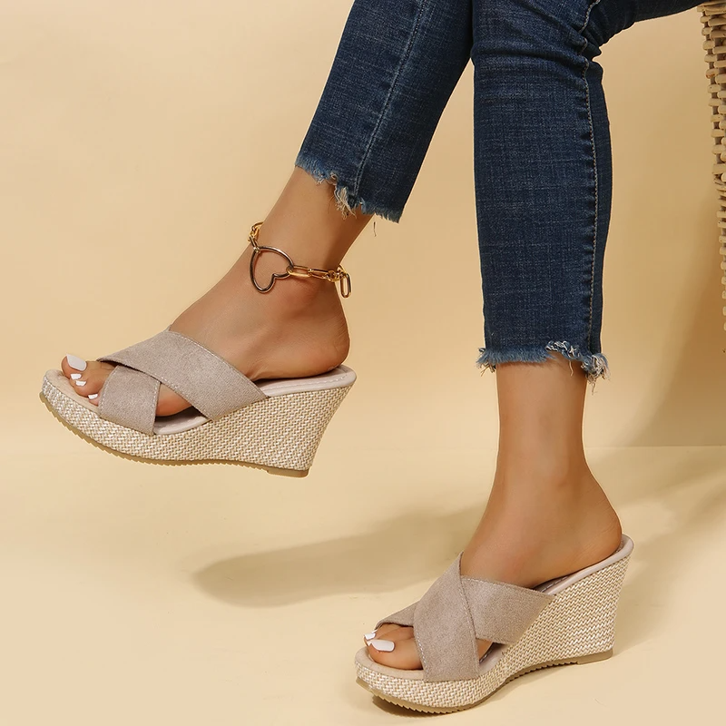 Orthopedic women's wedge sandals with braided strap and open-toe, offering comfort and style for summer outings.