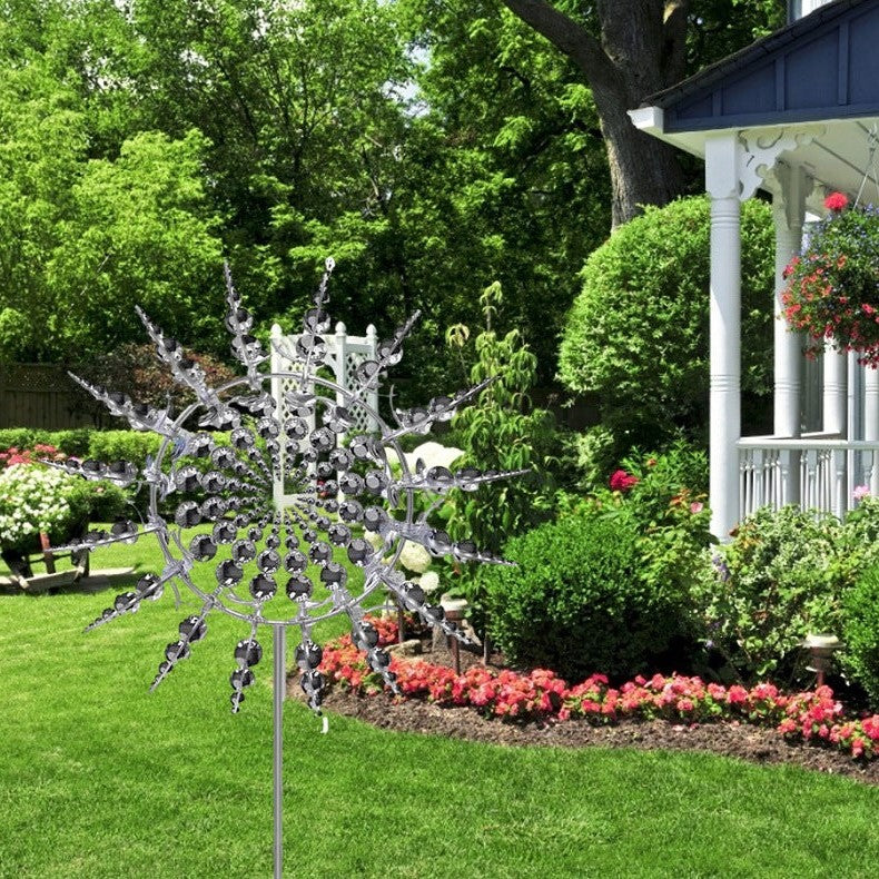 Outdoor anti-rust kinetic metal wind spinner with elegant wings, adds motion and charm to garden, perfect for year-round deco
