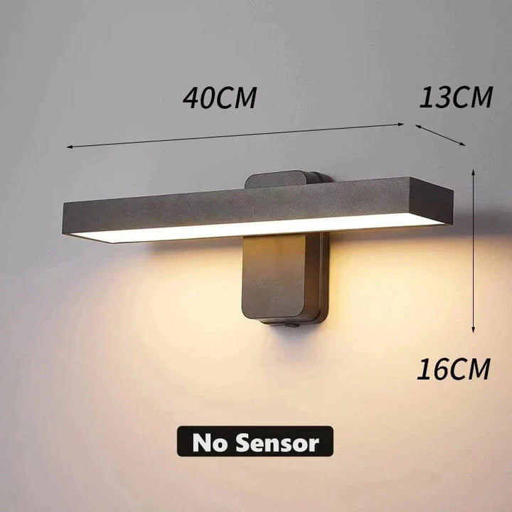 "Outdoor PIR motion sensor wall light, black aluminium, IP65 waterproof, rotatable design, warm white glow, modern style."