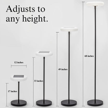 Outdoor solar floor lamp with metal and acrylic body, modern design, stands on patio illuminating with warm LED glow.