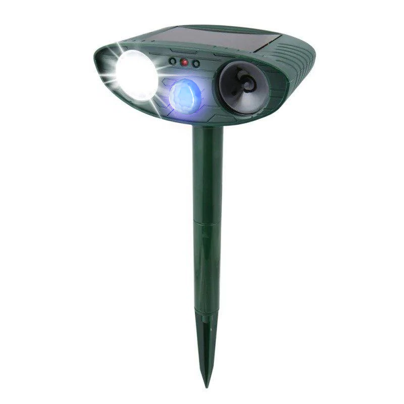 Outdoor solar ultrasonic cat repeller for gardens; eco-friendly device with motion sensors, green and black with solar panel.