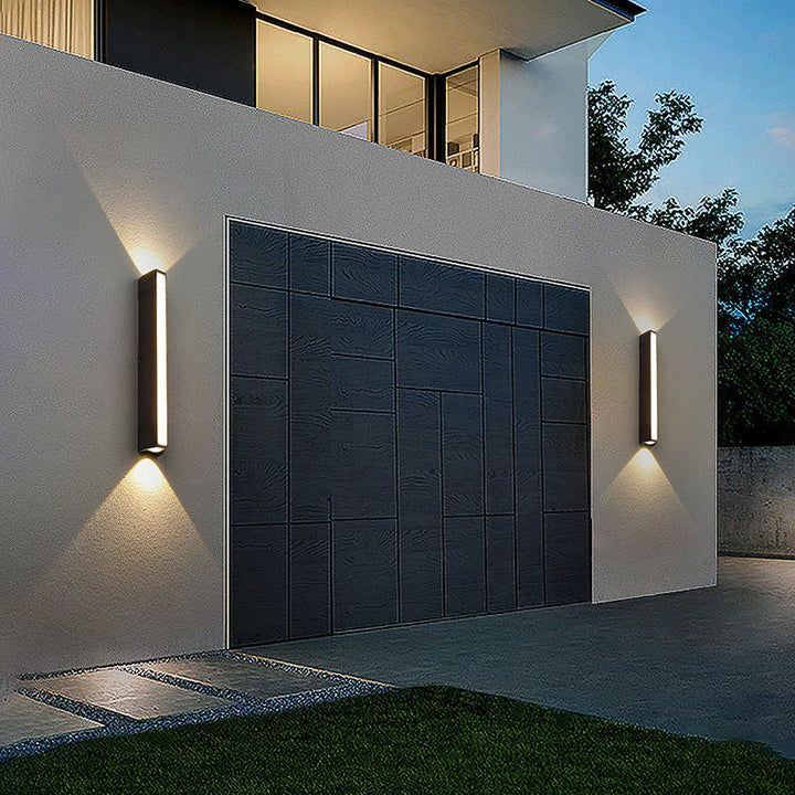 Outdoor wall light with LED technology, rustproof aluminum, sleek design, waterproof, ideal for garden or patio lighting.