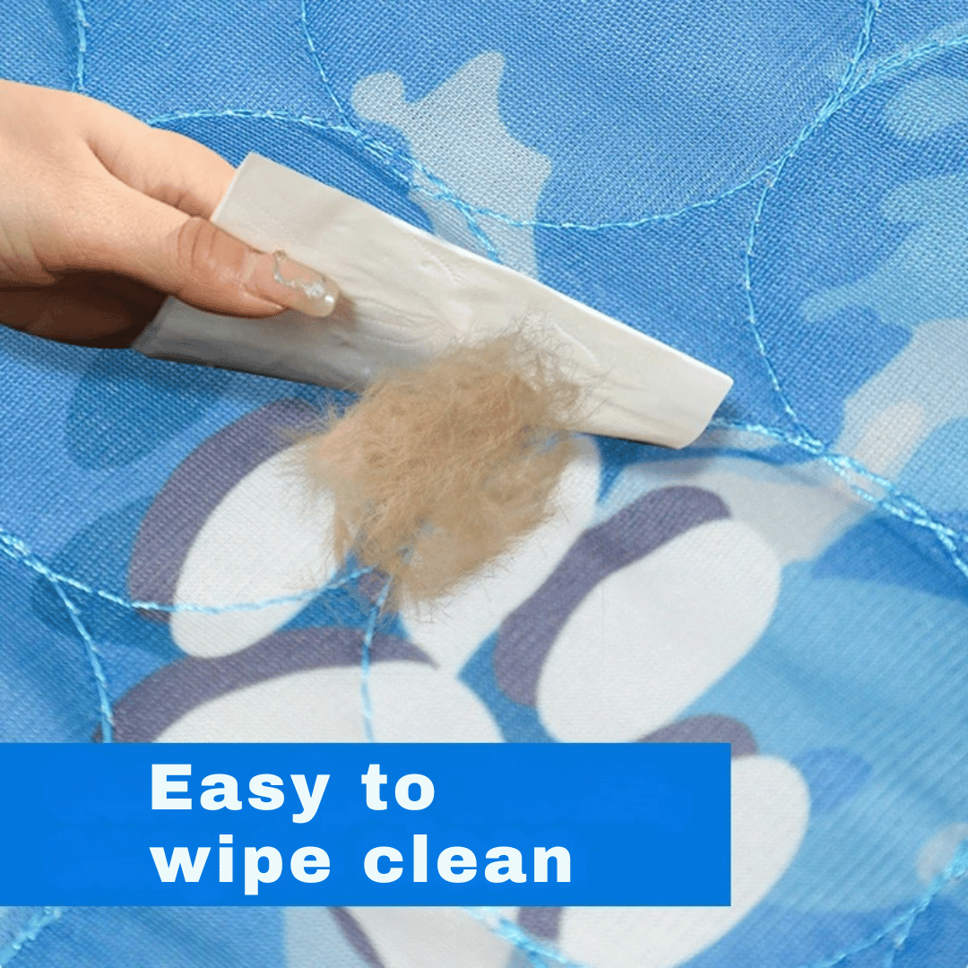 "Pale blue pet cooling mat on beige sofa provides comfort for dogs and cats during summer, featuring self-cooling ice silk fa