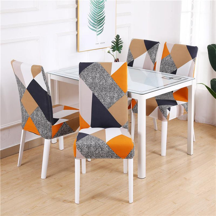 Patterned prismatic chair cover enhancing elegance; high-elasticity, anti-slip, durable fabric for stylish home décor.