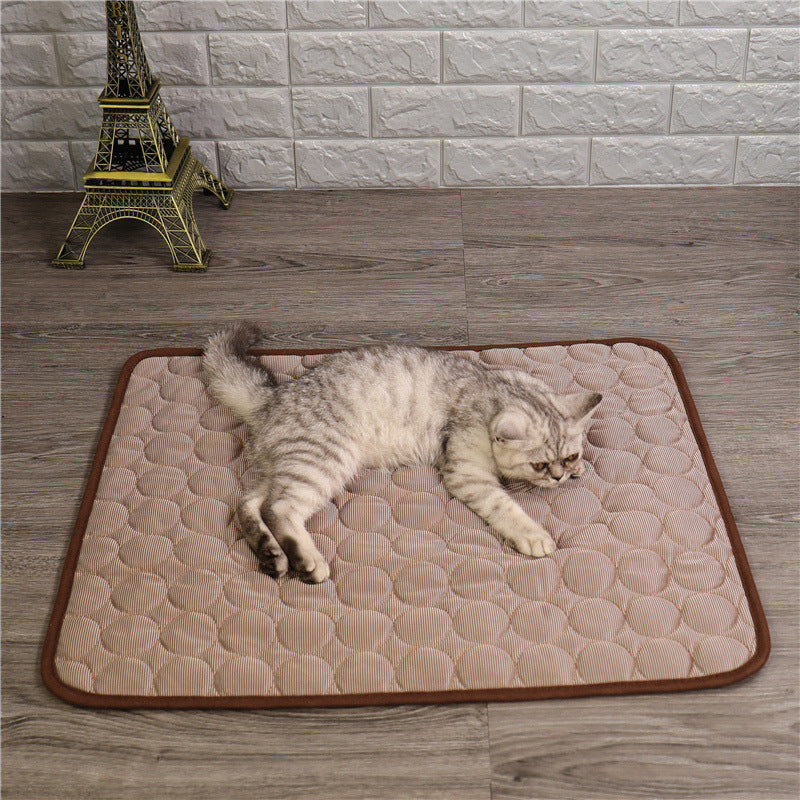 "Pet cooling pad in light blue, ideal for summer. Features breathable, machine-washable fabric, available in multiple sizes."