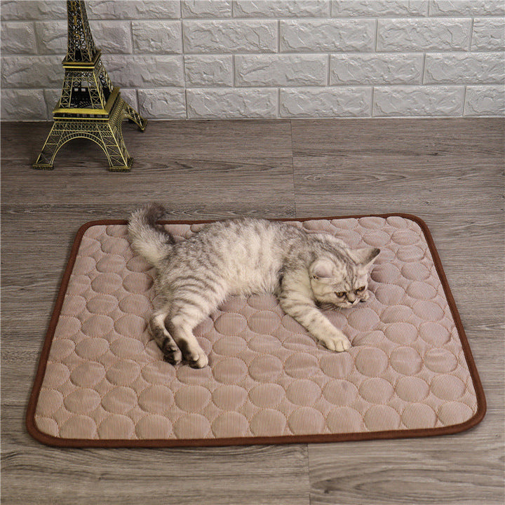 "Pet cooling pad in light blue, ideal for summer. Features breathable, machine-washable fabric, available in multiple sizes."