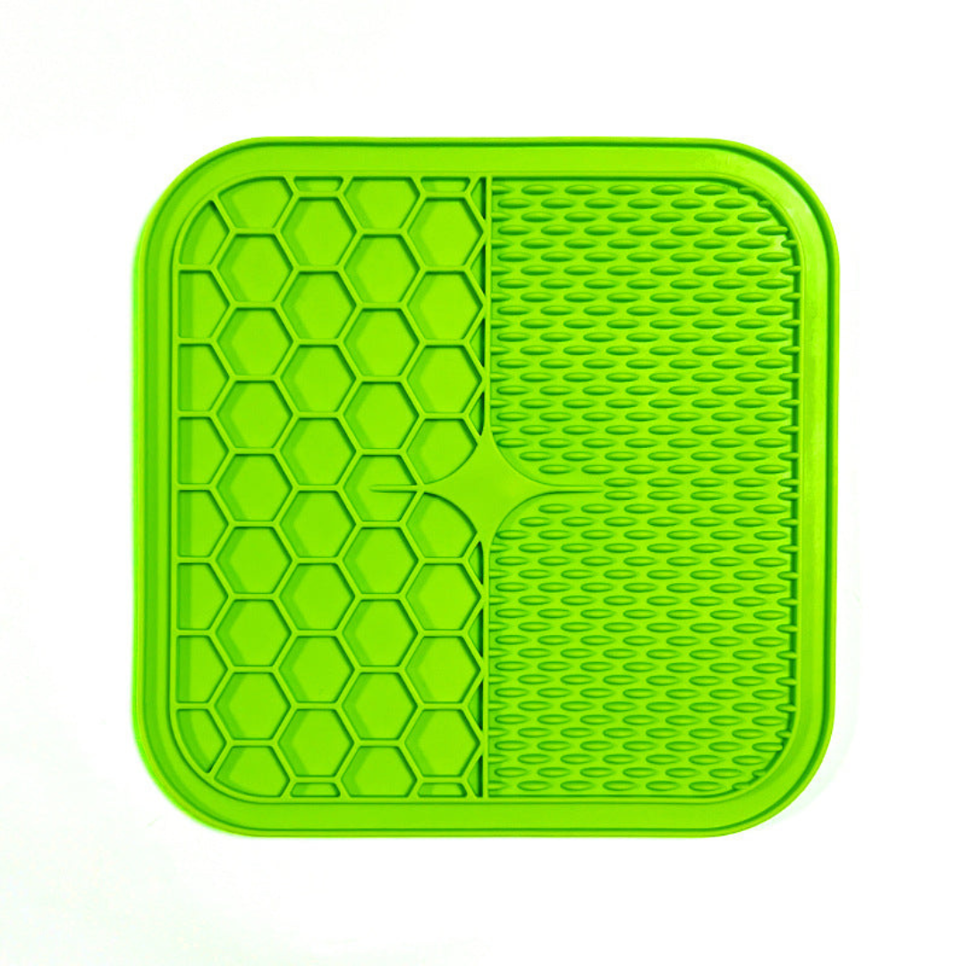 "Pet silicone lick mat in vibrant colors for stress relief and slow feeding; features textured surface for pets' wellness."
