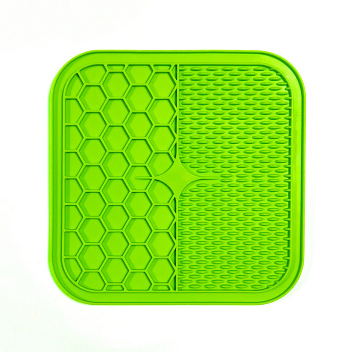 "Pet silicone lick mat in vibrant colors for stress relief and slow feeding; features textured surface for pets' wellness."