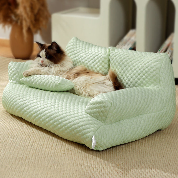 "PetChill Cooling Couch with ice silk fabric, ergonomic pet bed in soft hues, breathable design, perfect for hot days."