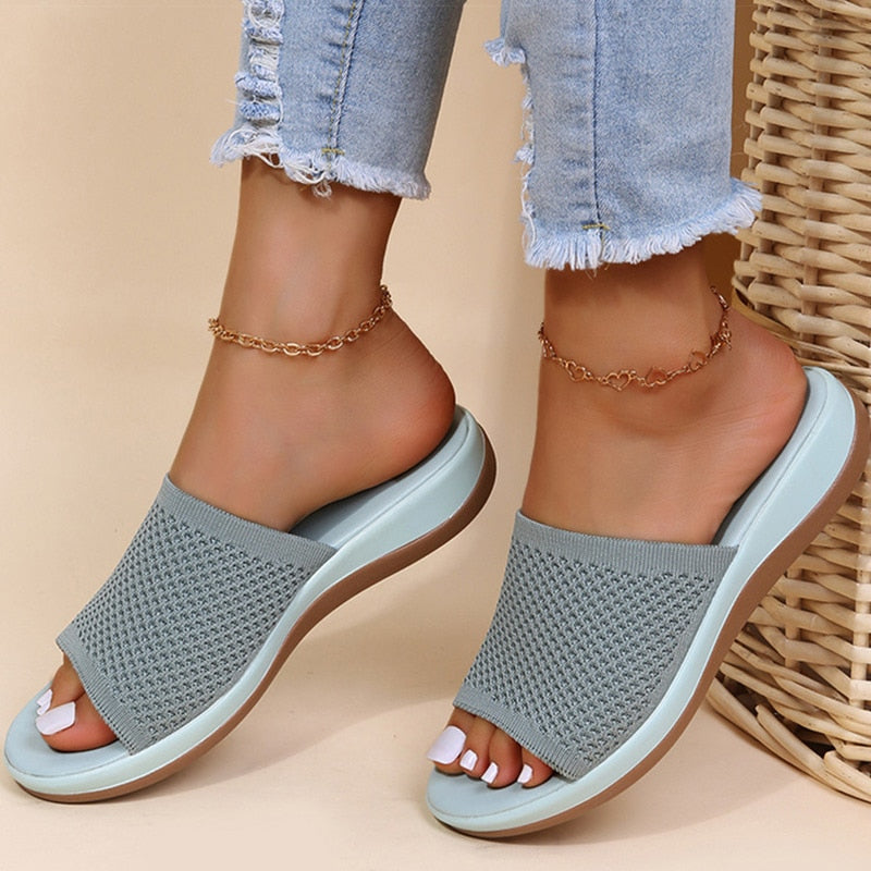 Pink women's breathable summer orthopedic slippers with adjustable straps and soft insoles for comfort and support.