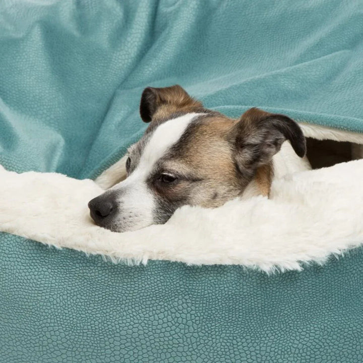 "Plush faux fur pet cave bed for cats and dogs, beige color, offering cozy comfort and security with orthopedic support."