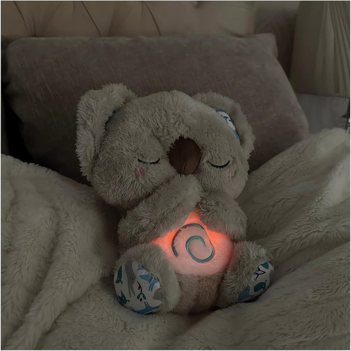 Plush teddy for kids with glowing nightlight, soothing heartbeat, realistic breathing; provides comfort and relaxation.